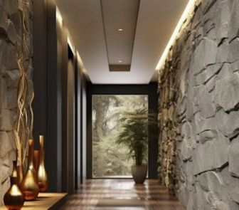 Hallway featuring stone walls and wooden floors.