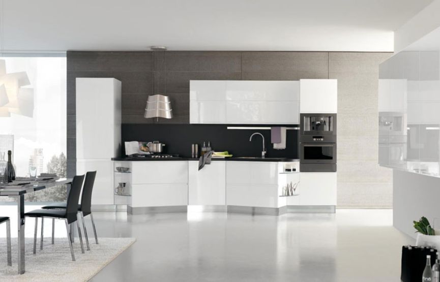 A contemporary kitchen featuring sleek white cabinets and stylish black accents.