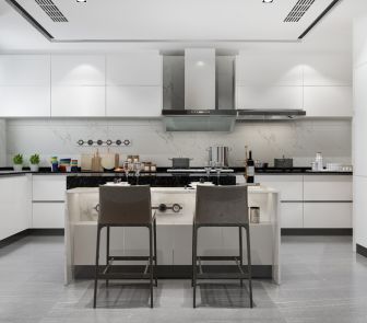 A luxurious modern kitchen featuring white cabinets and elegant gray flooring, designed by a top interior designer in Kolkata.
